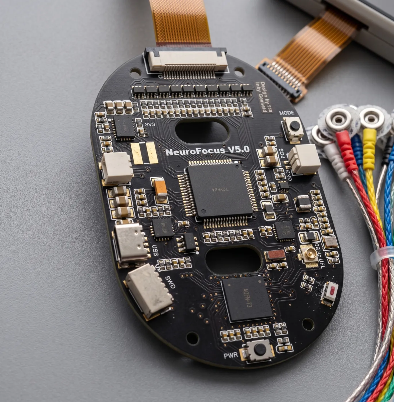 The single-channel dry-EEG board, bare on the bench